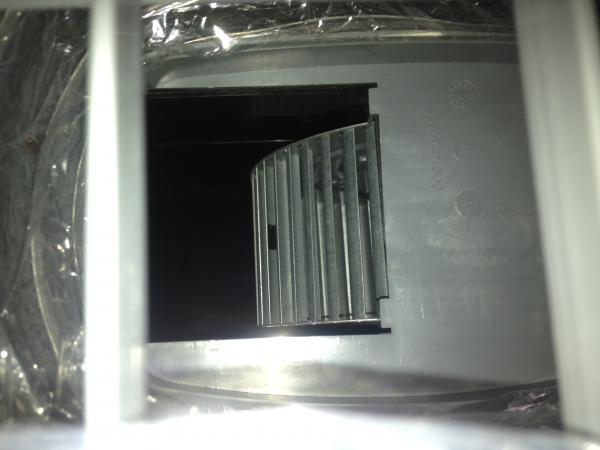 This is the view of the "squirrel cage" inside the air conditioner.
Note the clear plastic "duct" has been removed.