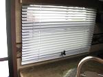 RV Window fix 002 1 
Used Extender (1") to extend window crank so it would not interfere with the venetian blind.  
Purchased locally at an RV...